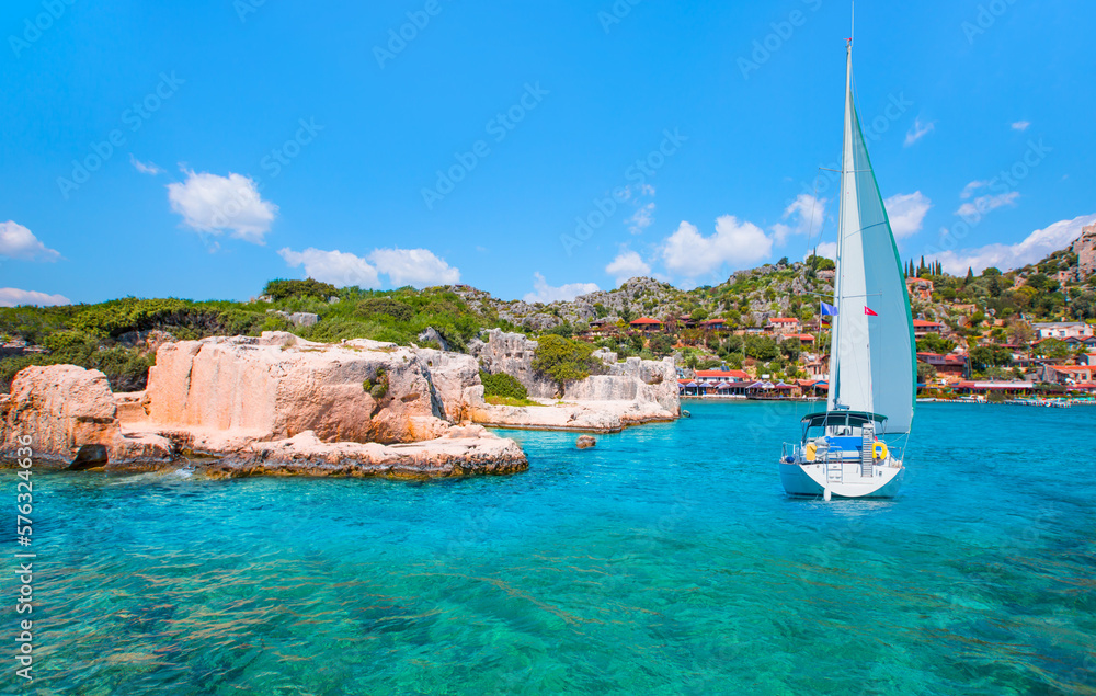 Obraz premium Sailing Yacht from sail regatta on mediterranean sea - Sailing luxury yacht with white sails in the Sea - Kekova island (ucagiz -Kale), Antalya Turkey