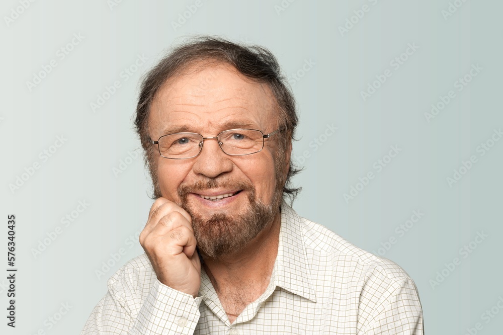 Happy old man posing on background Happy old man posing on background