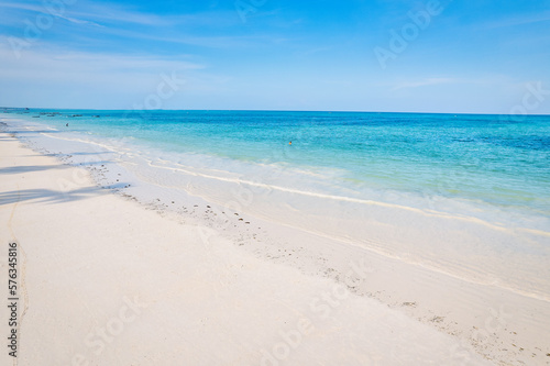 Behold the breathtaking aerial footage of Zanzibar s Kiwengwa beach  a tropical paradise with swaying palms and crystal-clear waters