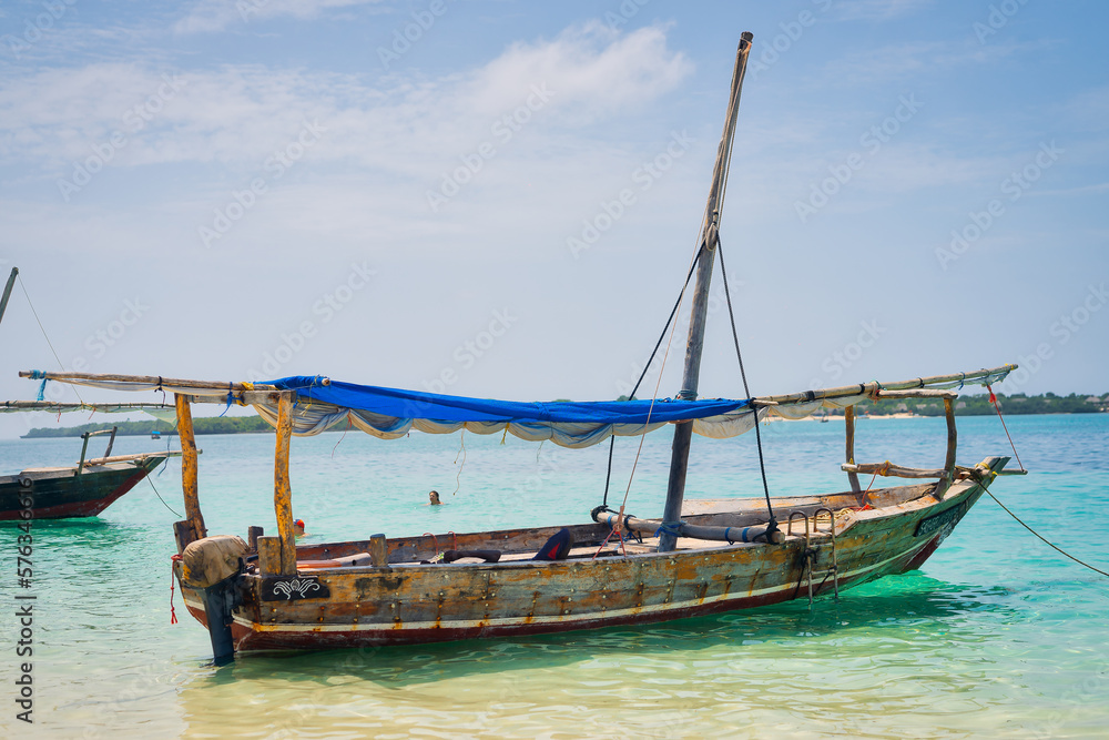 Board a traditional wooden dhow boat and discover the natural wonders of Zanzibar's Blue Safari, from coral reefs to deserted islands. Board a traditional wooden dhow boat and discover the natural wonders of Zanzibar's Blue Safari, from coral reefs to deserted islands.