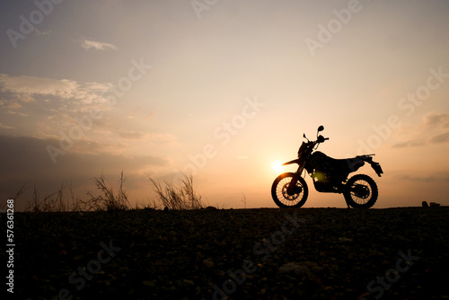 silhouette of a bike. silhouette of a motorcycle. motorcycle on sunset.  Silhouette Motocross Motorcycle