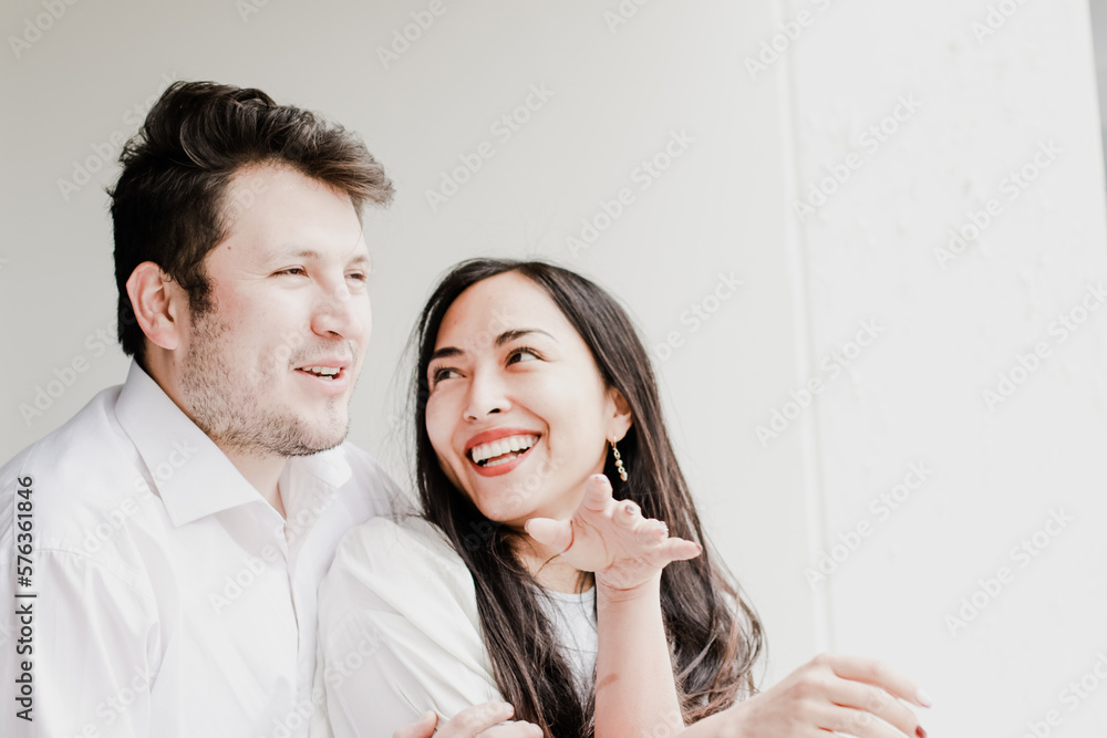 Photo of young couple enjoying, smiling, loving each other. Concept of lifestyle, human relations, love. Photo of young couple enjoying, smiling, loving each other. Concept of lifestyle, human relations, love.