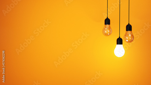Принти на полотні The concept of a light bulbs on an orange background, place for text and design,
