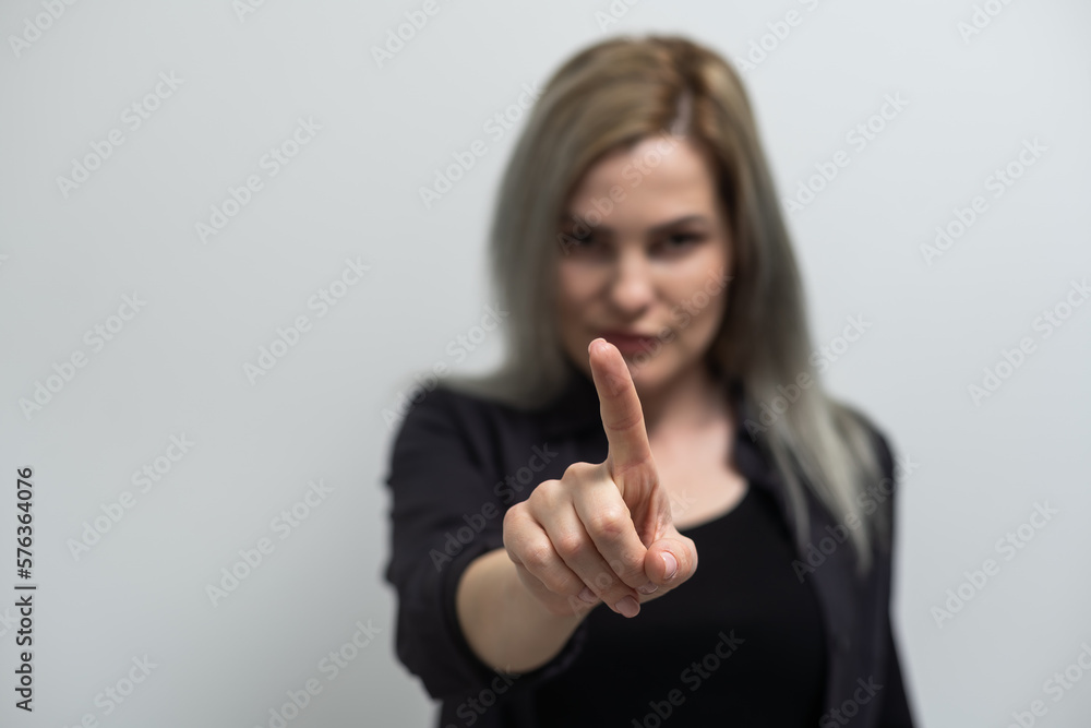 Happy female pointing or indicate something on the left side isolated on white. Happy female pointing or indicate something on the left side isolated on white.