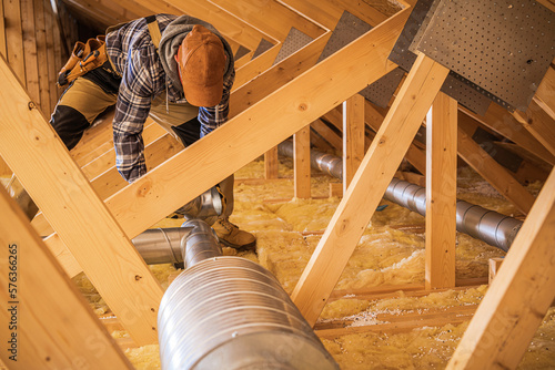 HVAC Worker Installing Air Ducts