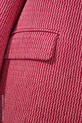 detail of a red jacket with a pocket close-up