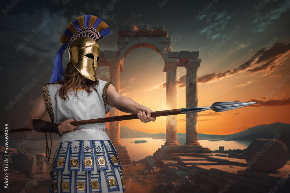 Fototapeta premium Art of greek female soldier with golden helmet and spear against sea and ancient columns.