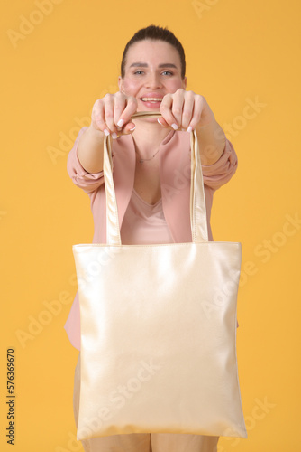 faux leather white shopper bag close up photo with model hand and face