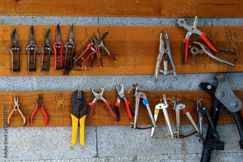 farm impliments hanging on wallmounts