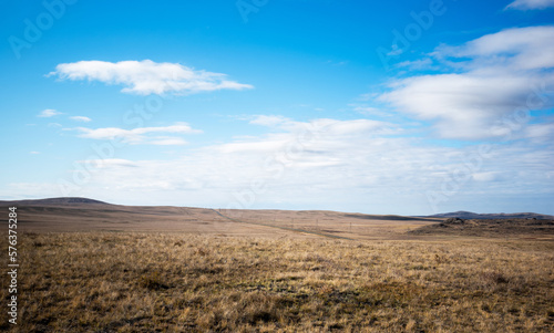 Autumn beauty of the vast plains in Haibei Tibetan Autonomous Prefecture  China. Breathtaking  amazing  endless landscapes under the bright blue sky.