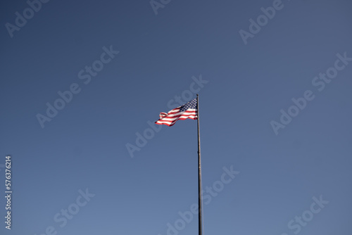 American flag on a blue sky