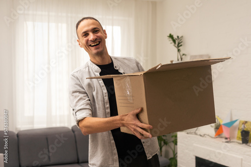Portrait of Young man during the move to their new home