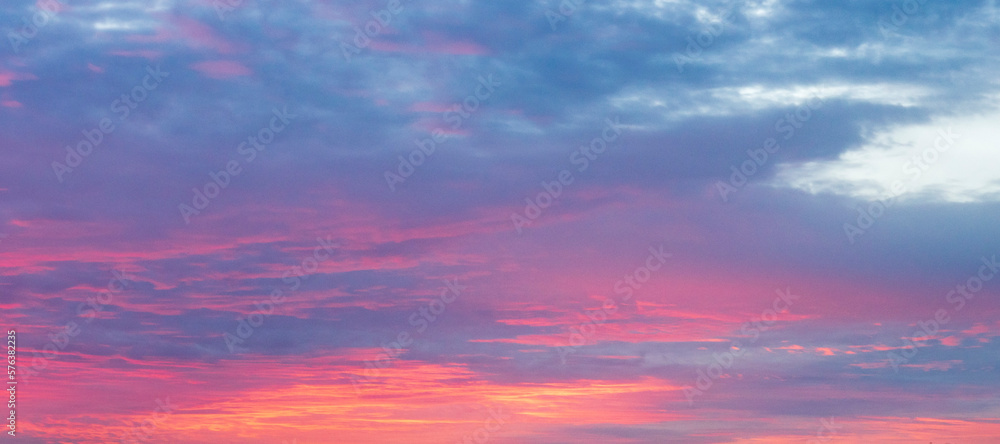A beautiful and vibrant colored sunrise sky and clouds 