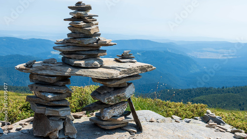 Photography Stack of zen stones on a top of a mountain