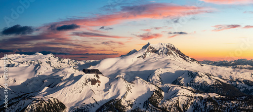 Canvas Print Aerial View from Airplane of Snow Covered Canadian Mountain Landscape in Winter