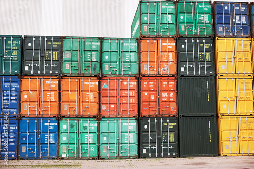 Safe storage for special cargo. A photo of colorful containers stacked on top of one another with copyspace..