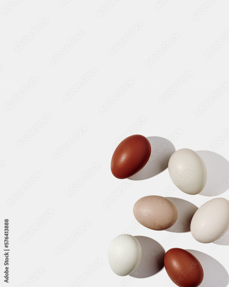 Easter eggs red gradient with hard Shadow at sunlight, frame and light background. Chicken egg on table, top view, minimal flat lay, holiday food still life, Viva Magenta color trend Easter eggs red gradient with hard Shadow at sunlight, frame and light background. Chicken egg on table, top view, minimal flat lay, holiday food still life, Viva Magenta color trend