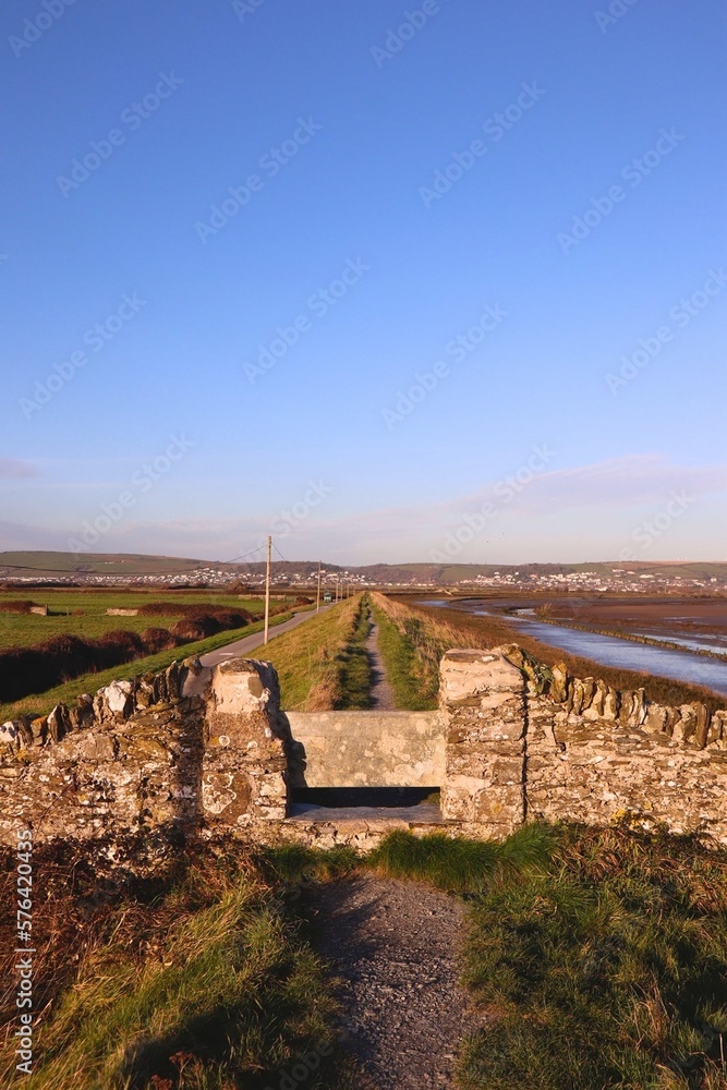 Stone gate on country coastal path