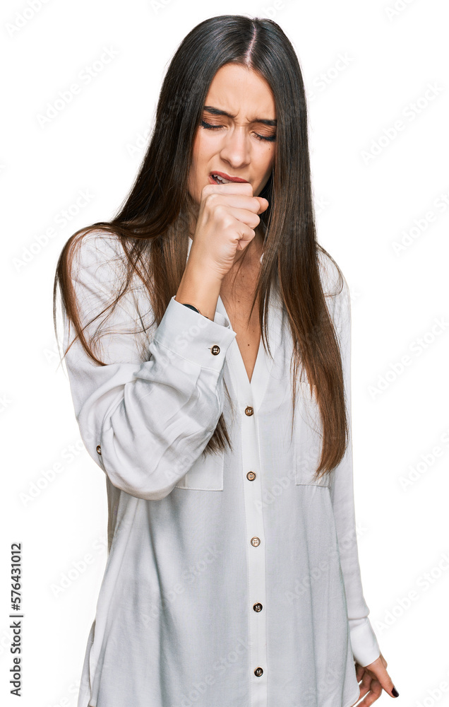 Young beautiful woman wearing casual white shirt feeling unwell and coughing as symptom for cold or bronchitis. health care concept. Young beautiful woman wearing casual white shirt feeling unwell and coughing as symptom for cold or bronchitis. health care concept.