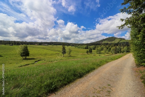 A landscape with mountains, meadows and streams around Horska Kvilda, Czech republic  photo