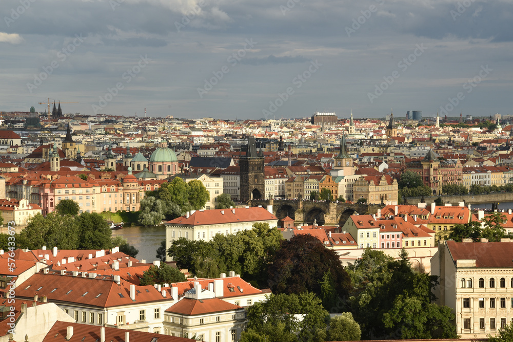 View on Prague city during summer with houses, trees and churches, Czech republic.