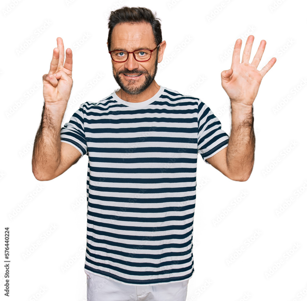 Middle age man wearing casual clothes and glasses showing and pointing up with fingers number eight while smiling confident and happy. Middle age man wearing casual clothes and glasses showing and pointing up with fingers number eight while smiling confident and happy.