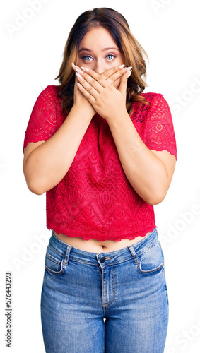 Young beautiful caucasian woman wearing casual clothes shocked covering mouth with hands for mistake. secret concept.