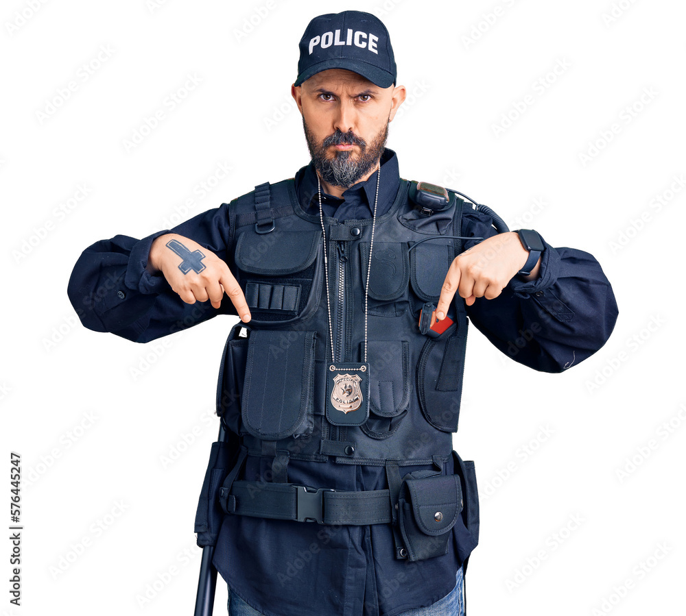 Young handsome man wearing police uniform pointing down looking sad and upset, indicating direction with fingers, unhappy and depressed. Young handsome man wearing police uniform pointing down looking sad and upset, indicating direction with fingers, unhappy and depressed.
