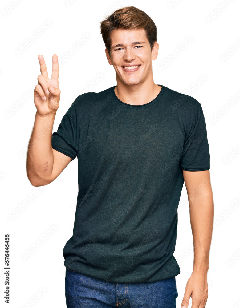 Handsome caucasian man wearing casual clothes showing and pointing up with fingers number two while smiling confident and happy. Handsome caucasian man wearing casual clothes showing and pointing up with fingers number two while smiling confident and happy.
