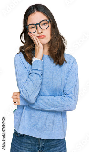 Принти на полотні Young beautiful woman wearing casual clothes and glasses thinking looking tired and bored with depression problems with crossed arms