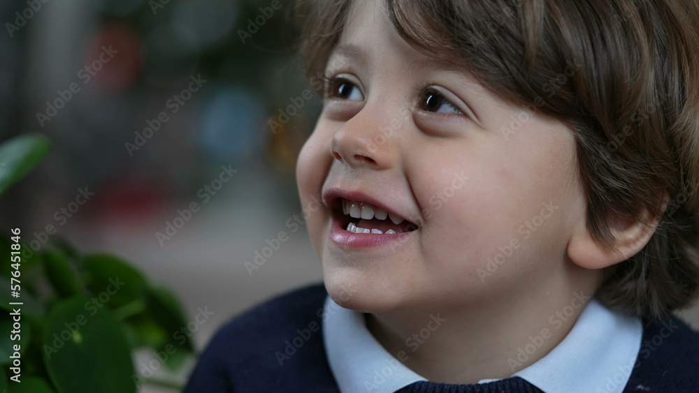 One happy little boy portrait face closeup. 2 year old Baby toddler child smiling One happy little boy portrait face closeup. 2 year old Baby toddler child smiling