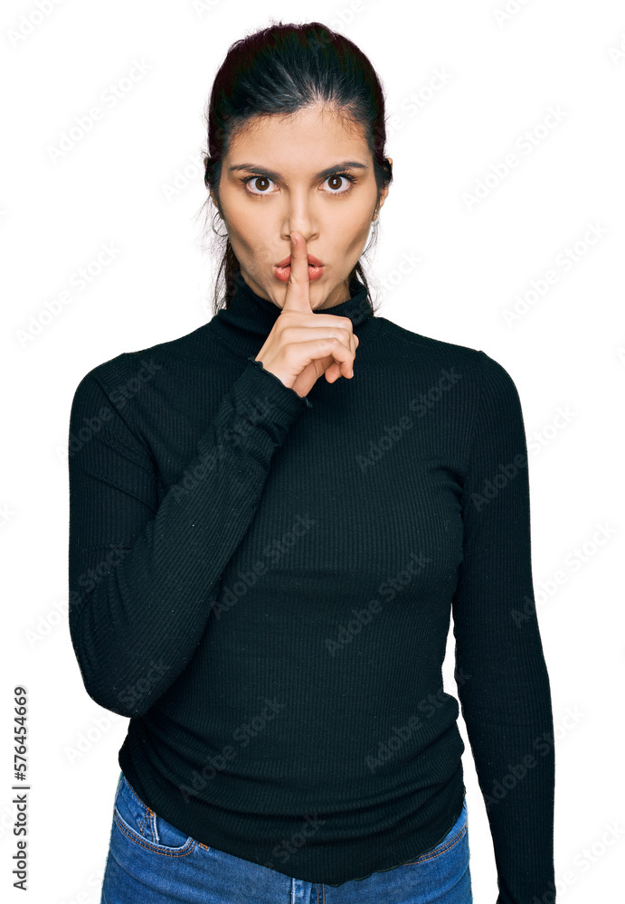 Young hispanic woman wearing casual clothes asking to be quiet with finger on lips. silence and secret concept. Young hispanic woman wearing casual clothes asking to be quiet with finger on lips. silence and secret concept.