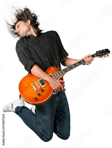 Portrait of a Musician Jumping while Playing an Electric Guitar Fototapet
