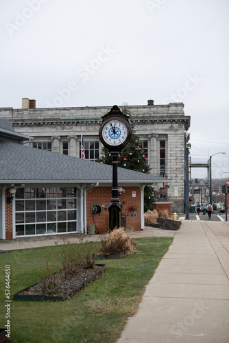 Clock street downtown during winter photo