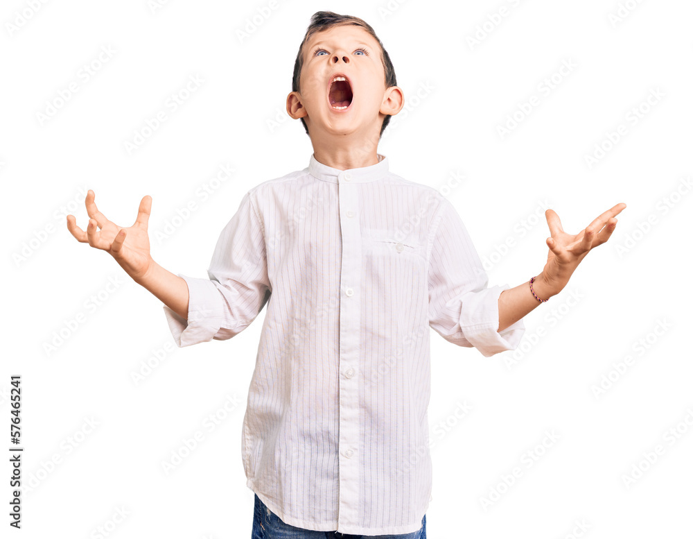 Cute blond kid wearing elegant shirt crazy and mad shouting and yelling with aggressive expression and arms raised. frustration concept. Cute blond kid wearing elegant shirt crazy and mad shouting and yelling with aggressive expression and arms raised. frustration concept.