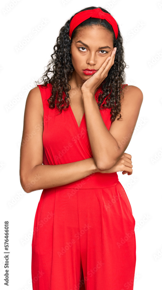 Young african american girl wearing elegant and sexy look thinking looking tired and bored with depression problems with crossed arms. Young african american girl wearing elegant and sexy look thinking looking tired and bored with depression problems with crossed arms.