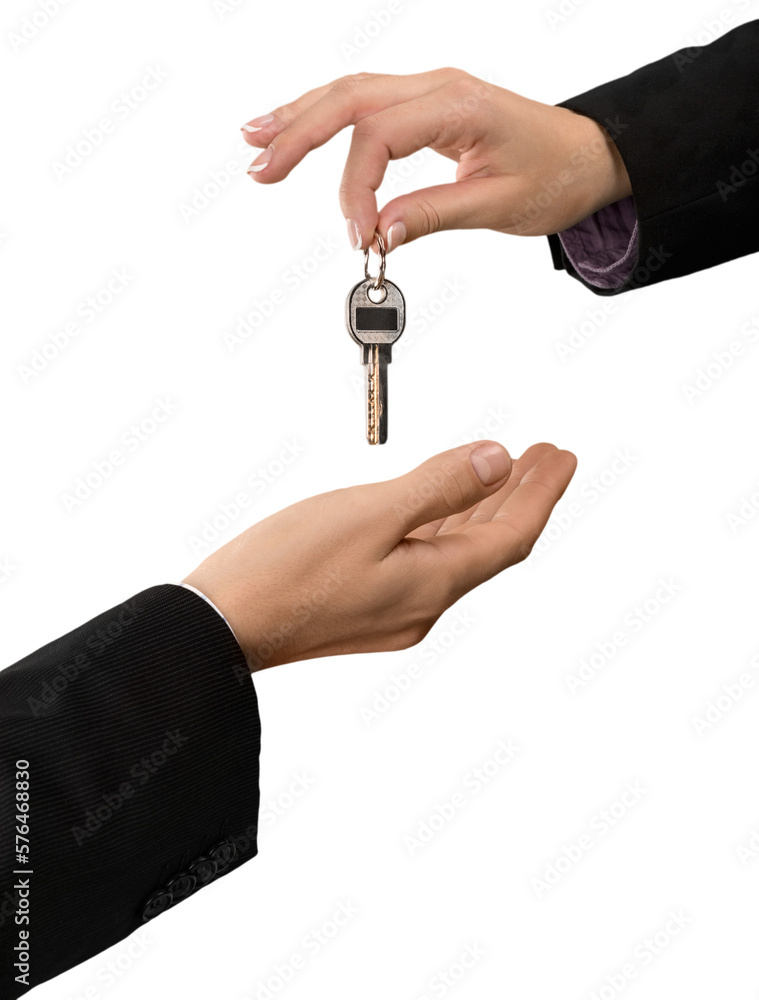 Businessperson Giving the Keys to Another Businessperson Businessperson Giving the Keys to Another Businessperson