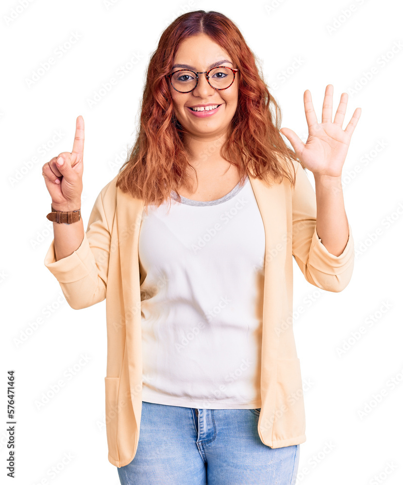 Young latin woman wearing business clothes showing and pointing up with fingers number six while smiling confident and happy. Young latin woman wearing business clothes showing and pointing up with fingers number six while smiling confident and happy.