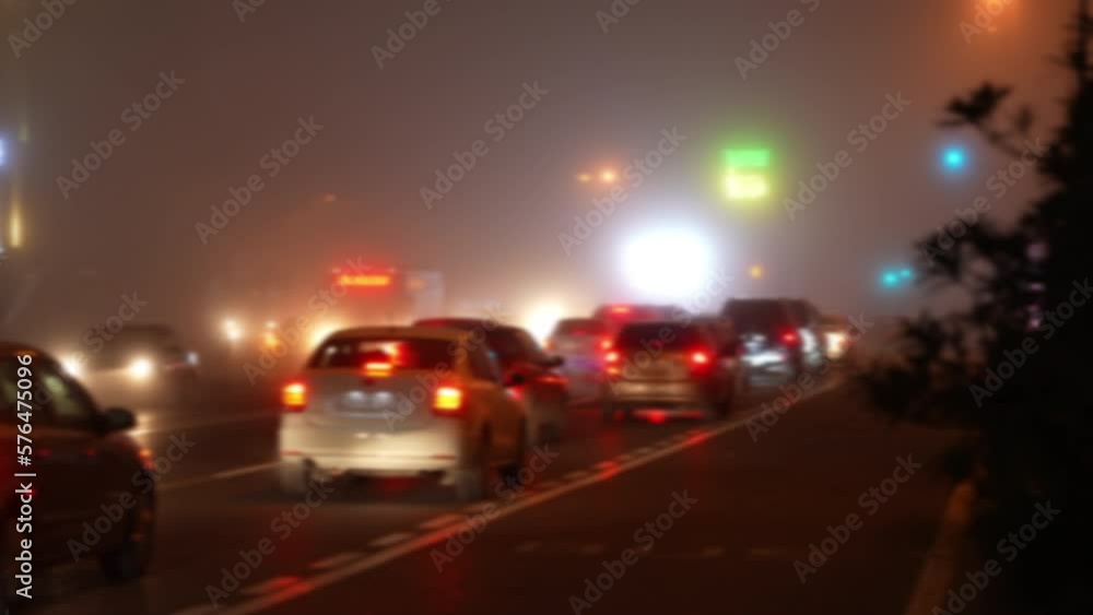 Traffic jam in the city on a foggy evening Traffic jam in the city on a foggy evening