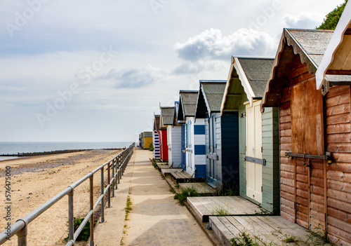 Traditional wooden beach huts on the promenade in the seaside town of Cromer