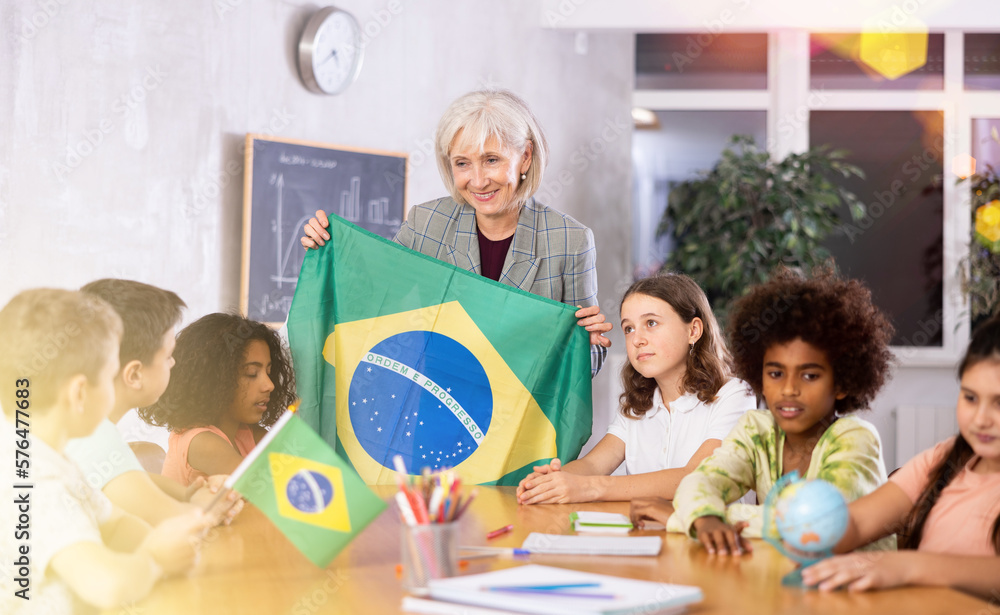 Fototapeta premium Kids learning together about brazil in geography class
