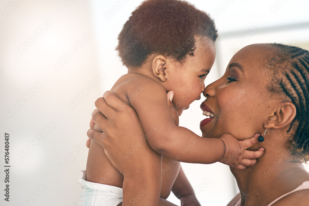 Fototapeta premium Smile, touch and nose with mother and baby for bonding, affectionate and connection in family home. Kindness, happiness and happy with black woman holding child for positive, growth and support