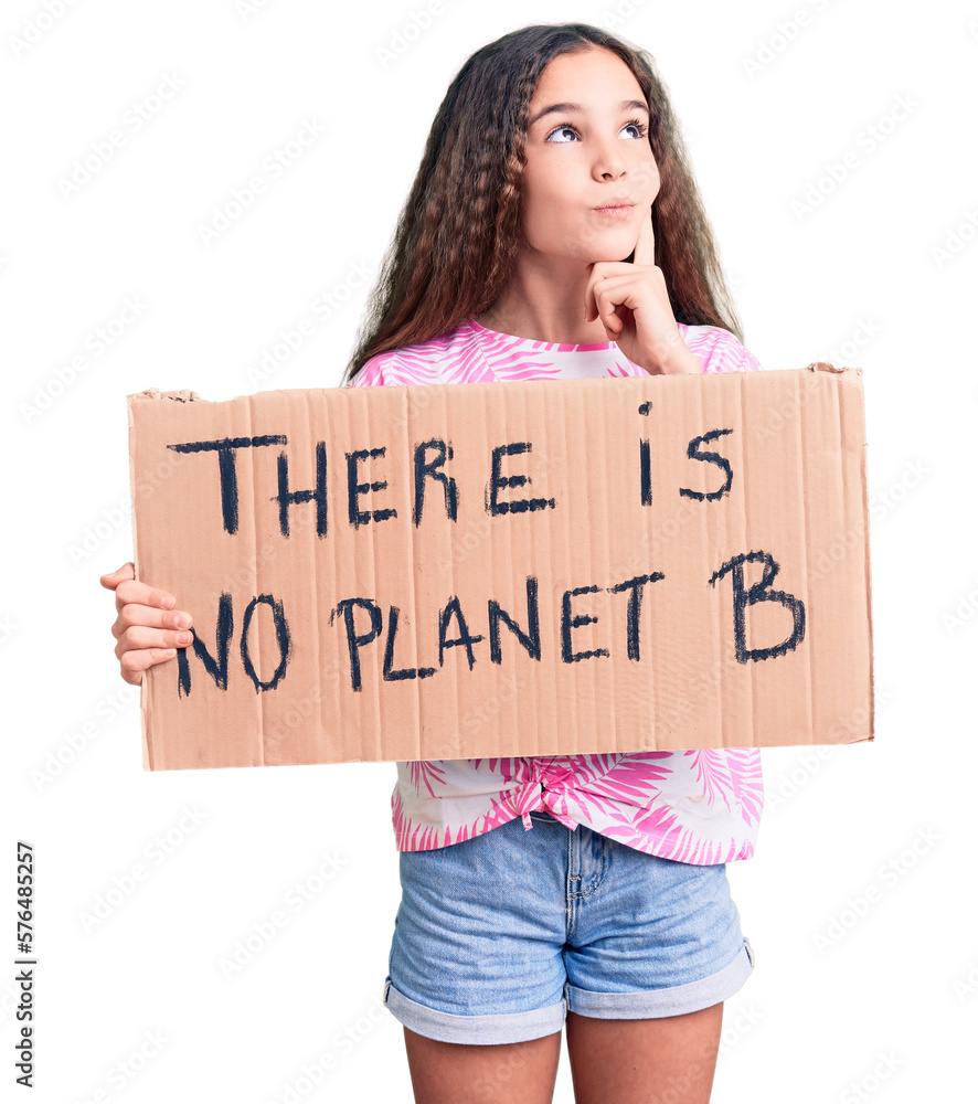Cute hispanic child girl holding there is no planet b banner serious face thinking about question with hand on chin, thoughtful about confusing idea Cute hispanic child girl holding there is no planet b banner serious face thinking about question with hand on chin, thoughtful about confusing idea