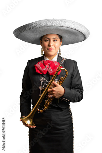 female mexican mariachi trumpetist woman smiling using a traditional mariachi girl suit on a white background. good looking latin hispanic trumpet player musician feminine using a white hat photo