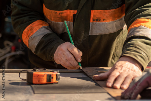 cutting metal with an angle grinder,wood, worker, carpenter, work, construction, tool, working, diy, home, equipment, craftsman, job, people, tools, hand, repair, person, woman, building, carpentry, h