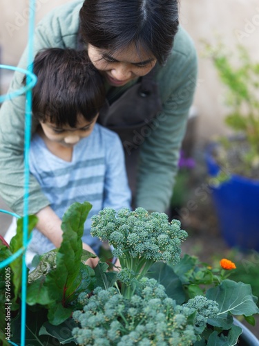 Mother and son tending the garden 
