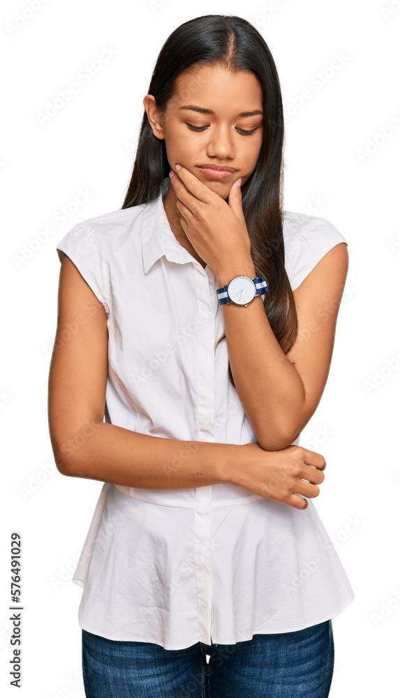 Beautiful hispanic woman wearing casual clothes thinking looking tired and bored with depression problems with crossed arms.