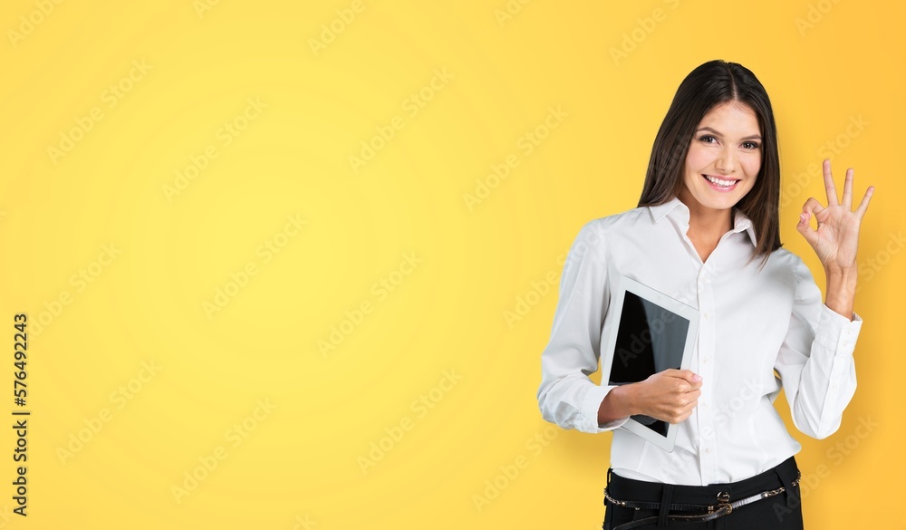 Happy young smart woman posing on background Happy young smart woman posing on background