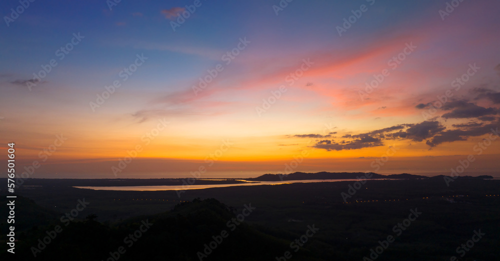 Aerial view beautiful sunset or sunrise light dramatic sky over mountain landscape