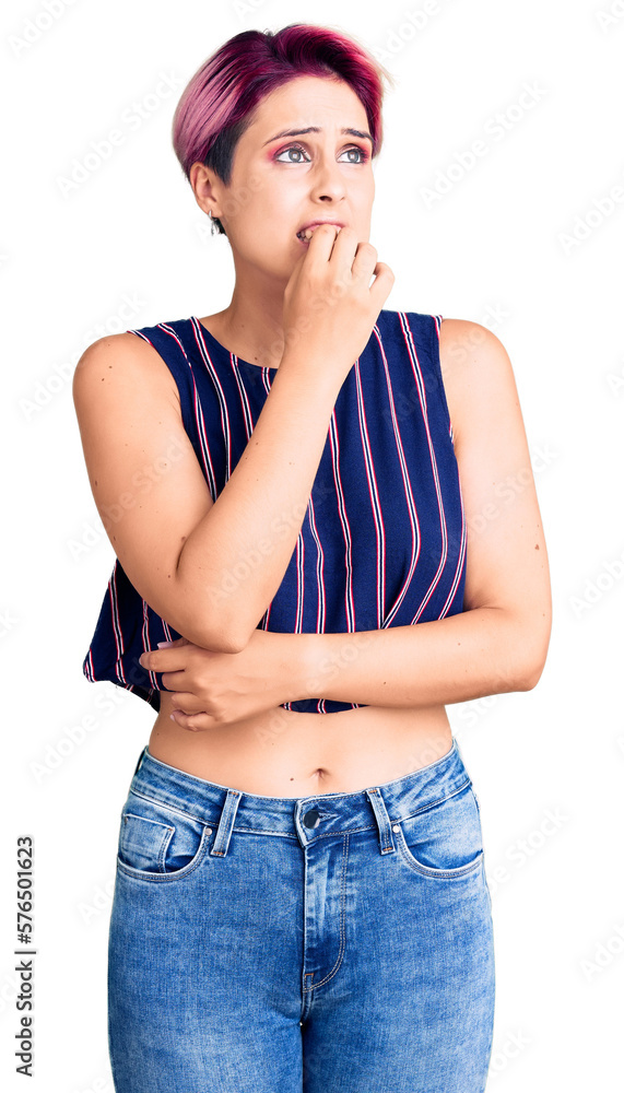 Young beautiful woman with pink hair wearing casual clothes looking stressed and nervous with hands on mouth biting nails. anxiety problem. Young beautiful woman with pink hair wearing casual clothes looking stressed and nervous with hands on mouth biting nails. anxiety problem.